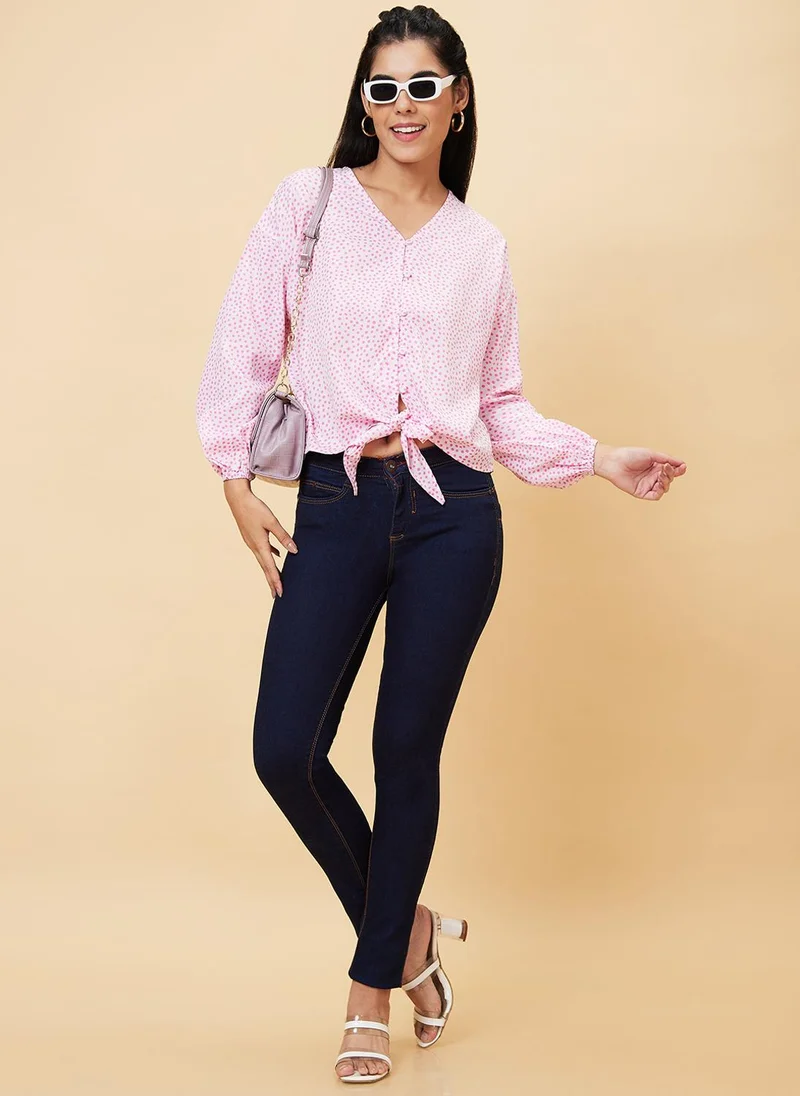 جلو باص بلوزة نسائية جلوبس بطبعة هندسية وردية برباط